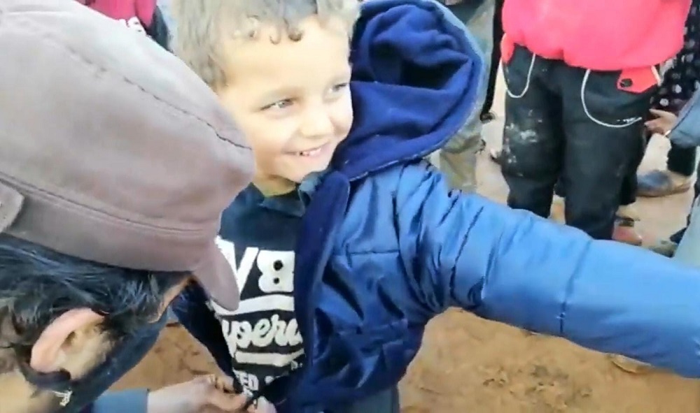 Coat and boot aid to the children of Idlib