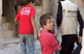 Suriye İdlib'de yetim yardımları dağıttık